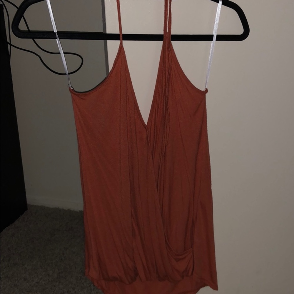 Foreign exchange orange halter style top